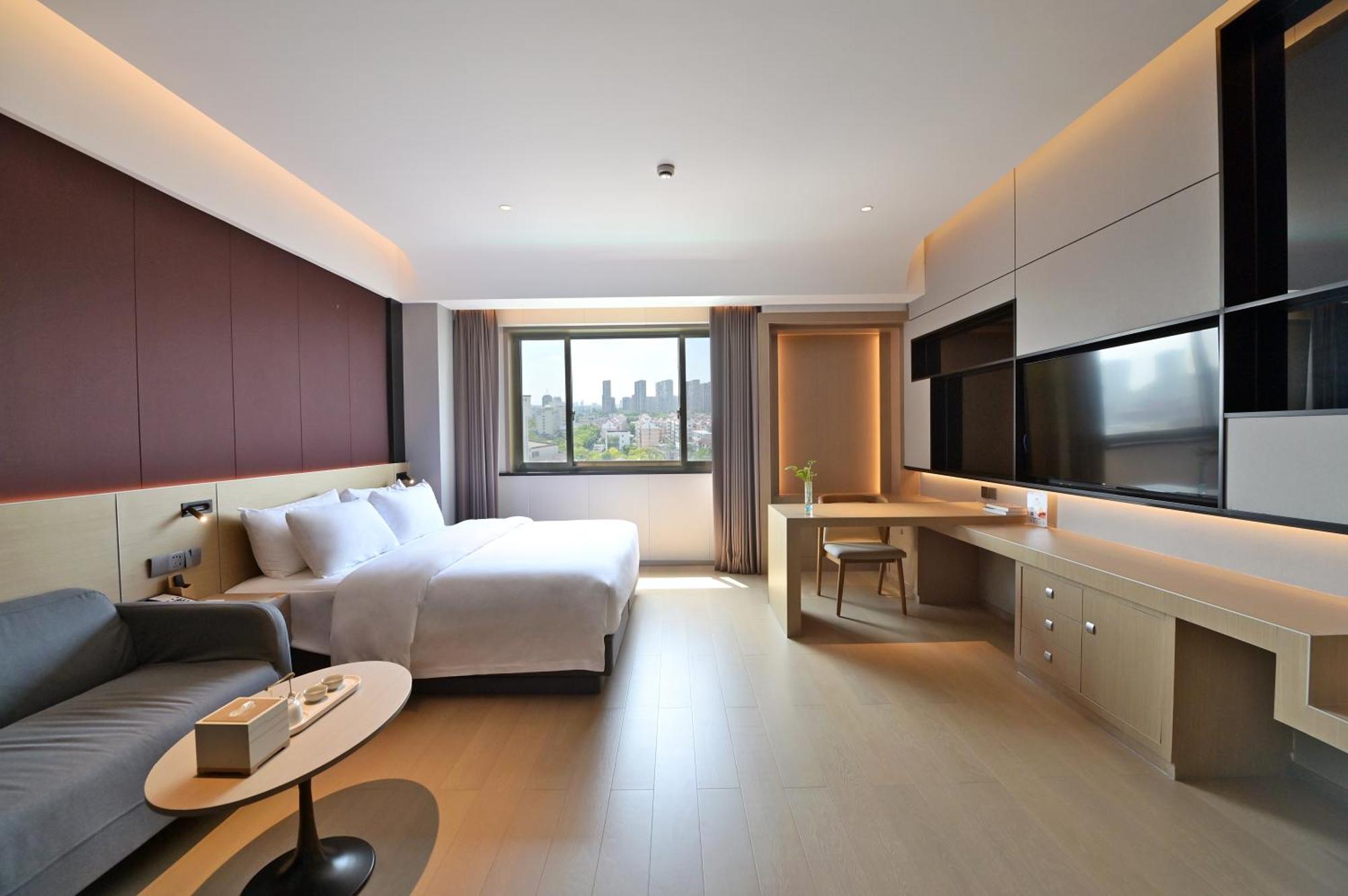 Maison New Century Tongxiang Exterior foto